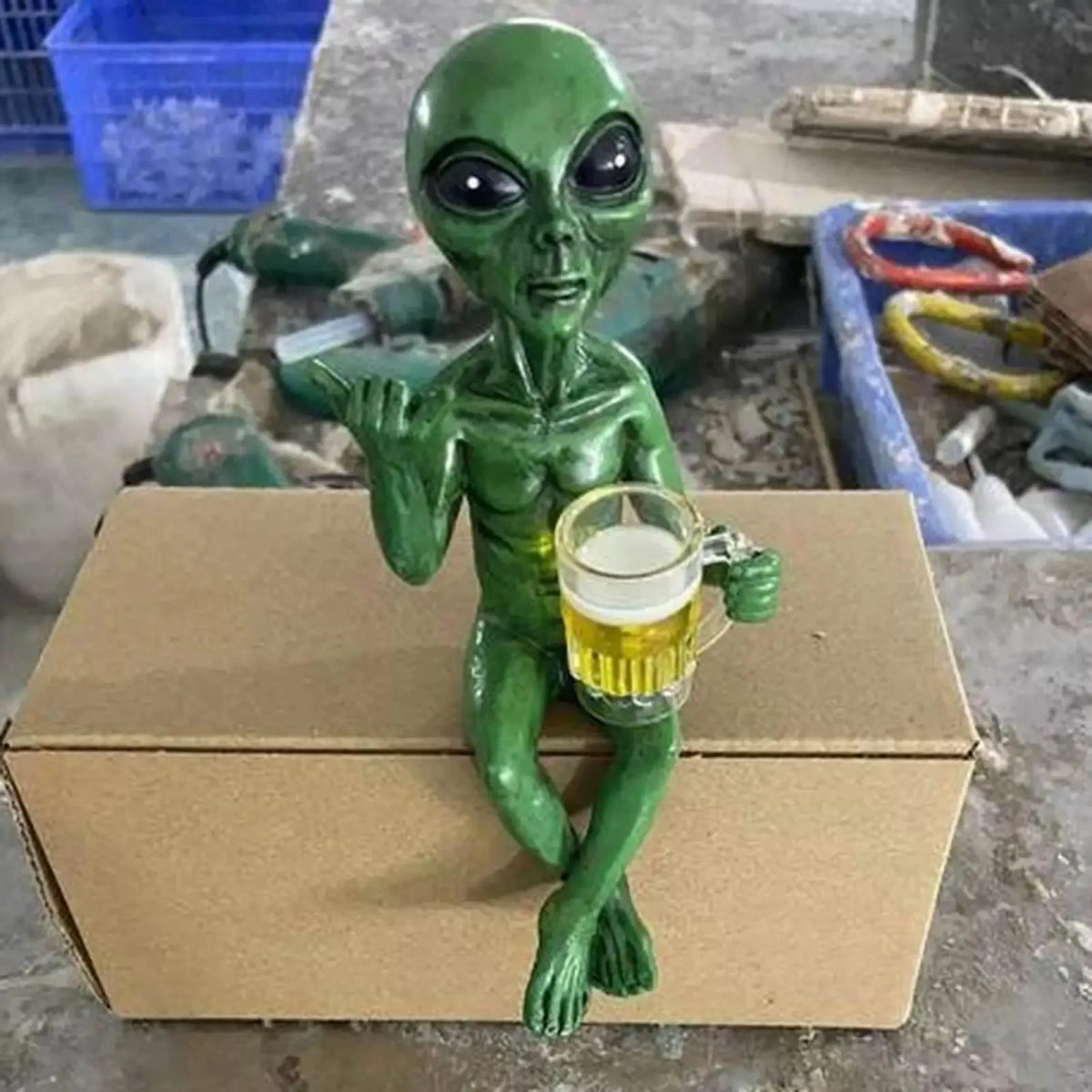 Alien Statue Drinking