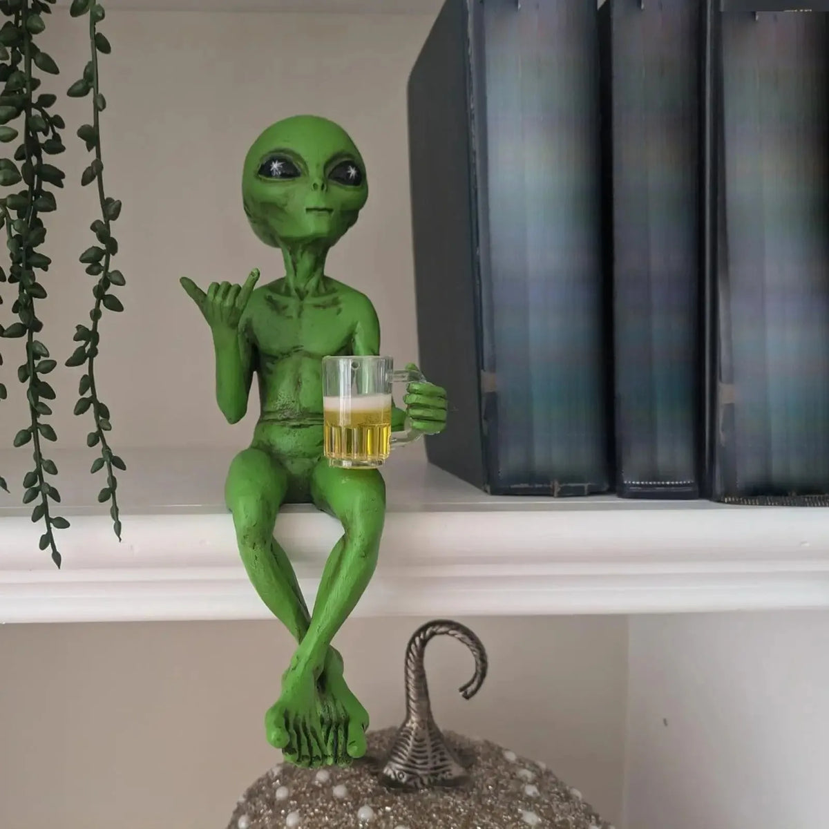 Alien Statue Drinking