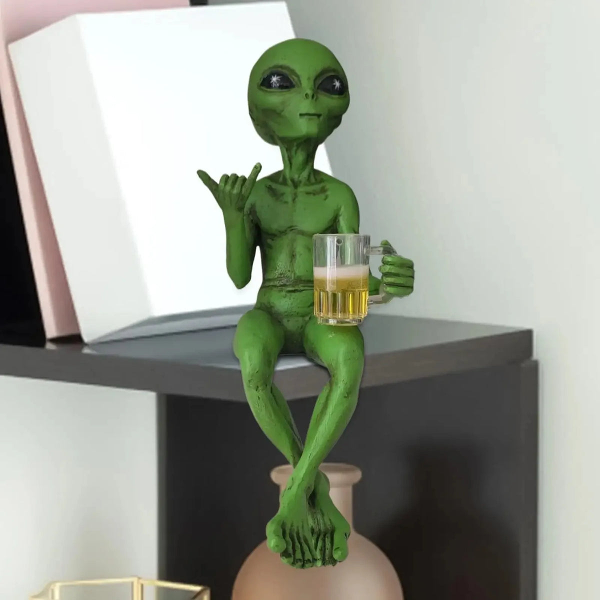 Alien Statue Drinking